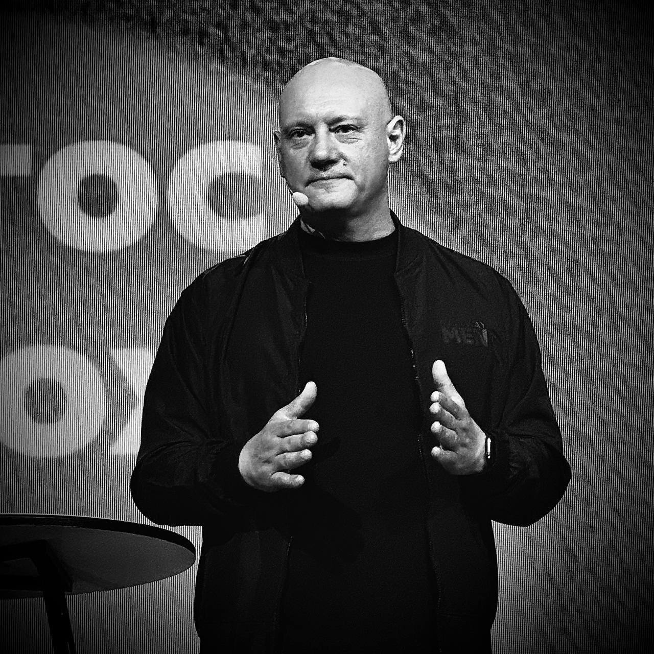 Dmitriy Bodu speaking on stage